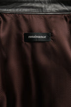 Close-up of a brown textured fabric with a 'renaissance' label.
