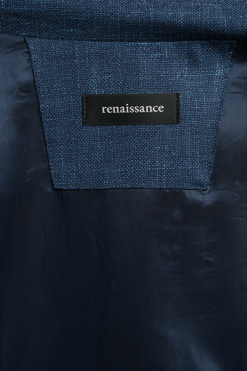 Navy blue fabric with 'renaissance' label