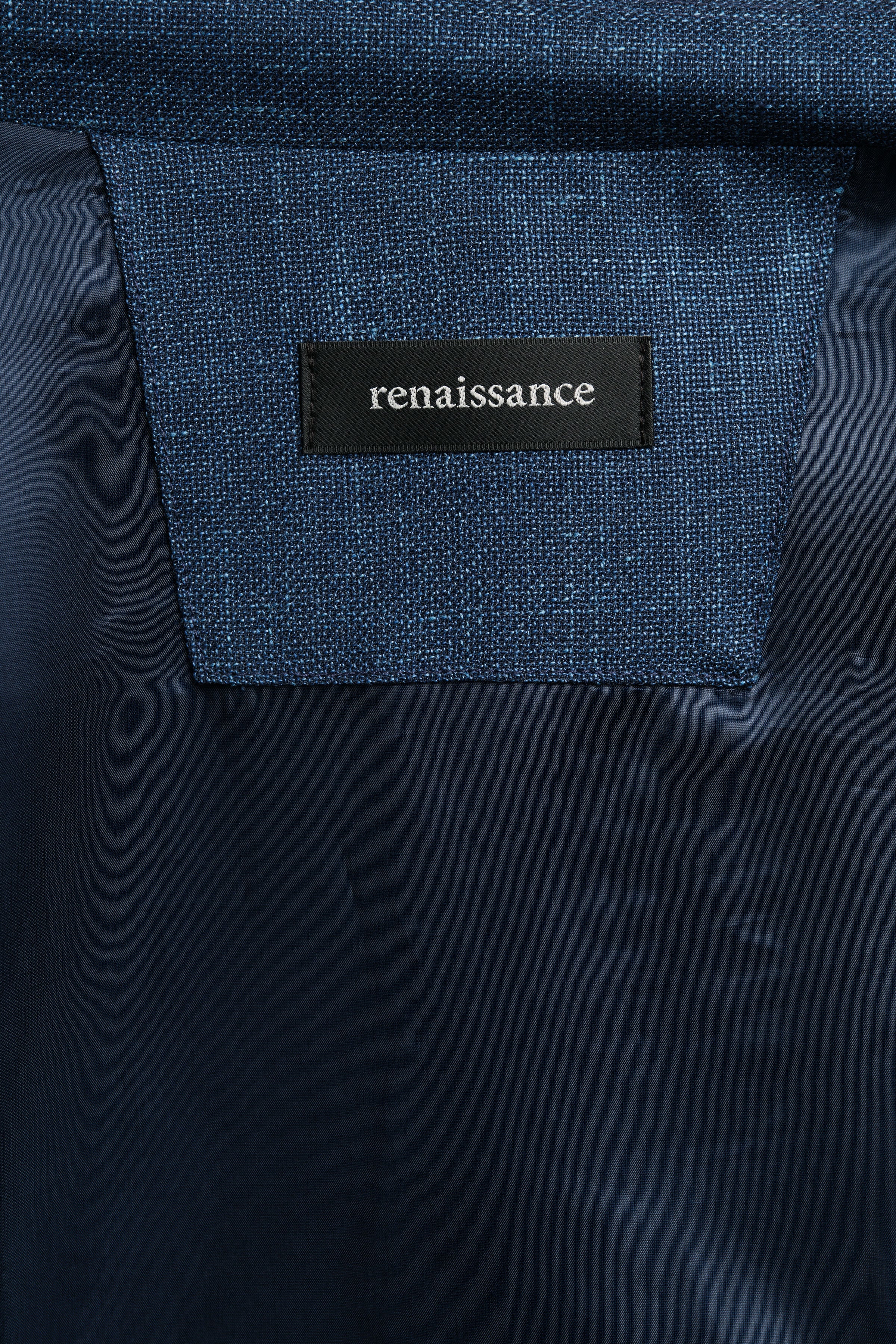 Navy blue fabric with 'renaissance' label